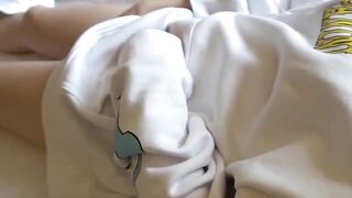 Petite Japanese girl rubs her pussy before warm peeing shower