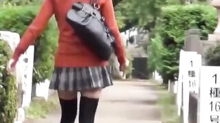 Pretty Asian lifts skirt and floods rack with golden piss