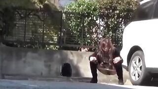 Pretty Asian lifts skirt and floods rack with golden piss