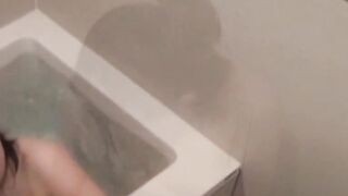 Cam films cutie soaping tits and furry pussy in the bath