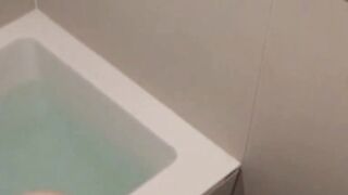 Cam films cutie soaping tits and furry pussy in the bath
