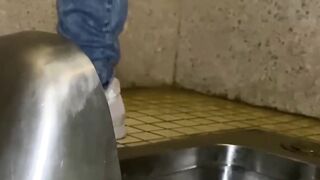 Masked Japanese girl pees after sensual pussy play