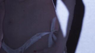 Busty mature redhead MILF strips on stage to flaunt her huge tits