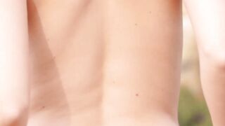 Big tits Nude latina Ali Rose sitting on a large log legs wide open
