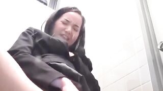 Public Restrooms - Busty Brunette Fingering Her Hairless Pussy