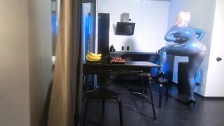 Pvc Latex Bondage Curvy mom Woman into Blue Texturized Catsuit.