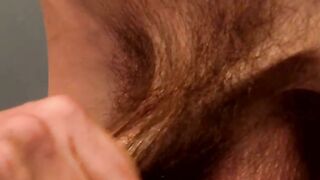 Amateur twink licking his armpits and wanking hairy cock
