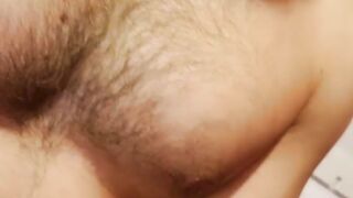 Young stud wanking off his mega cock in closeup