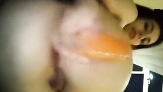 Carrot in my ass, dildo in my pussy