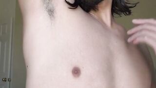 Stud teases with his hairy armpits before wanking on his dick