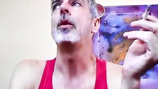 Nasty daddy Richard Lennox jerks off in the tub and blows cigarette smoke in your fac