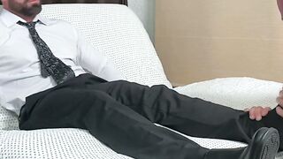 Suited hunk Joey J offers foot to get worships by bald stud Killian Knox