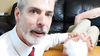 Professor Lennox tickles the feet of his student Jessie Russel through his stinky soc