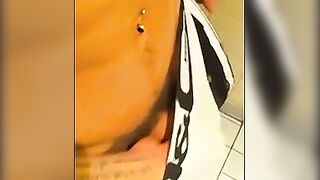 Amateur twink Mark Henley masturbating in the mens room