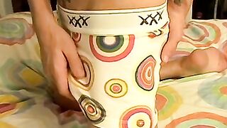 Cute cock guzzler lowers his undies and masturbates solo