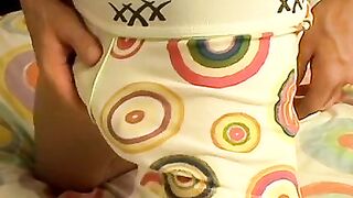 Cute cock guzzler lowers his undies and masturbates solo