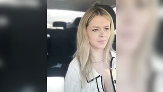 Sexy blonde bombshell teasing you with her cleavage baring outfit