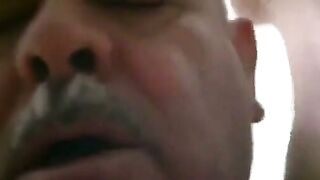 Bear Daddy's Pup Gets Fucked Raw" - This SEO-friendly and catchy video is about an older bear daddy fucking his younger pup raw in their bedroom with passion and intensity while wearing condoms to ensure safe sex practices