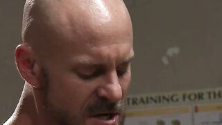 DILF Mitch Vaughn shoving a machine dildo into Ivan Gregorys defeated ass