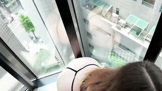 Brunette Bombshell Gives Intense Blow Job From High Rise Window