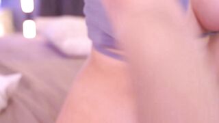 Sexy Blonde Cam Girl Strips and Poses Seductively on Bed