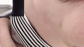 Voyeur Captures Cute Japanese Brunette Peeing in Bathroom