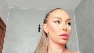 Sexy Blonde Webcam Model Teases with Big Tits and Pussy Toy