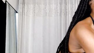 Sexy Ebony Cam Girl Teases with Dildo in Red Bikini