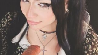 Goth Brunette Teases in Polka Dot Dress with Orange Dildo