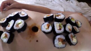 Nyotaimori (女 小 盛 り "serving on a Woman's Body")