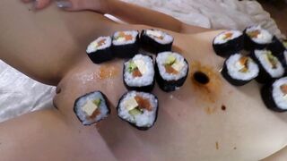 Nyotaimori (女 小 盛 り "serving on a Woman's Body")