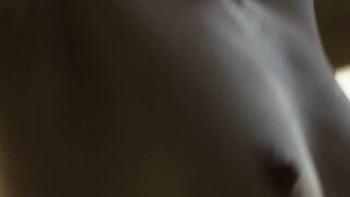 Petite Czech Teen Elilith Noir Strips and Poses on the Beach