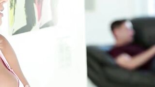 Blonde in Pink Lingerie Teases Man on Couch During Phone Call