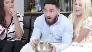 Blonde Woman Rides Bald Man on Bed in Bedroom Scene