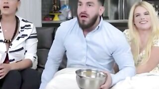 Blonde Woman Rides Bald Man on Bed in Bedroom Scene