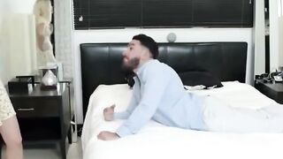 Blonde Woman Rides Bald Man on Bed in Bedroom Scene
