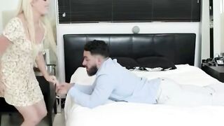 Blonde Woman Rides Bald Man on Bed in Bedroom Scene