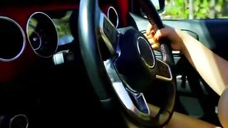 Brunette Driving Convertible in Tank Top