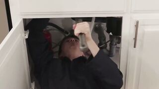 Redhead Shemale Kalli Grace Deepthroats Plumber's Big Cock in Kitchen