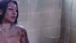 Tattooed MILF in Shower Gets Caught by Stepbrother