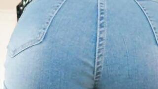 Brunette in Fishnet Top and Leather Jacket Teases Tight Ass in Denim Shorts