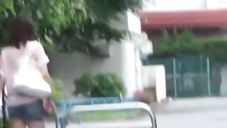 Japanese Girl Squats to Pee Outside Next to Car in Purple Shirt