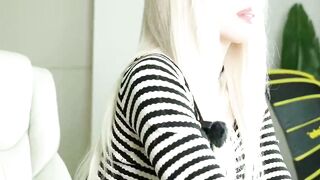 Blonde Babe Teases in Striped Top & Sheer Stockings