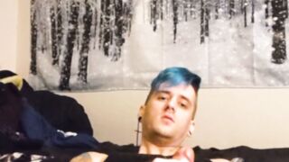 Blue Hair Guy in Fishnet Shirt Masturbates on Bed