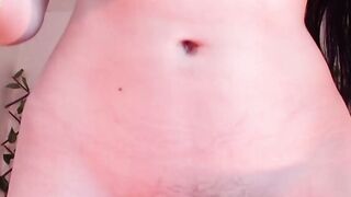 Bare Midriff Close-Up with Black Zipper Detail and Smooth Skin