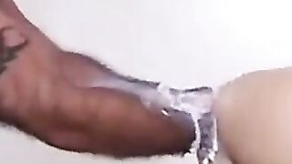 Tattooed Bald Man in Plaid Shorts Gives a Blowjob