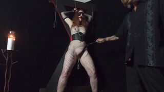 Red Haired cougar Bound to St. Andrews Cross and Brought to