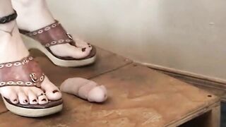 OLDER mom TRAMPLES FOOTSLAVES DICK WITH HER HEELS TEACHING HIM