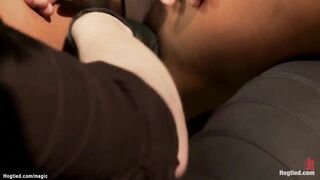 Black tied inside back bend on hogtie